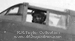Close-up of P/O A.D.J.Ball 427182 RAAF in the cockpit of a Halifax, 1652 HCU  Marston Moor, Yorkshire, January 1945, later in 462 Squadron.